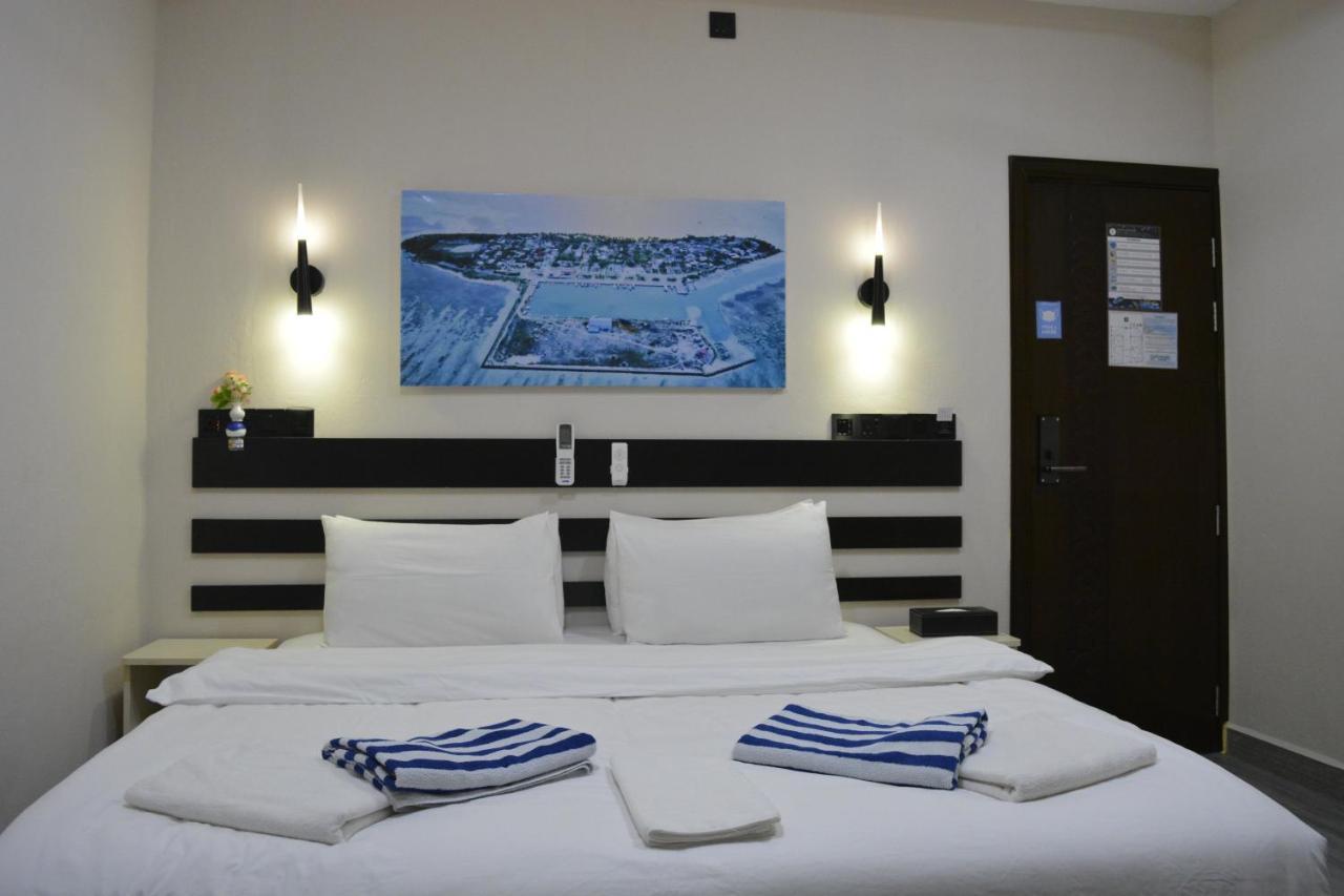 Infinity Dhiffushi Hotel Buitenkant foto