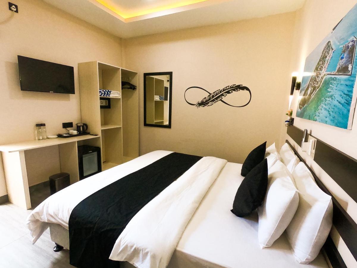 Infinity Dhiffushi Hotel Buitenkant foto